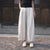 Pantalon ample pour femmes de style chinois à motif de broderie florale et de rayures