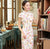 Flügelärmeln Schlüsselloch-Ausschnitt Chinesisches Cheongsam-Kleid mit Blumenmuster aus Seidenmischung