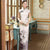 Robe chinoise Cheongsam en soie mélangée à imprimé lotus et mancherons
