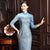 Elegante pizzo blu illusione collo e manica cheongsam integrale