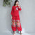 Blusa china tradicional con bordado floral y manga mandarina
