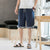 Leinen-Strandhose mit Blumendruck-Rand Lockere Hosen im chinesischen Stil Shorts