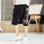 Pantalones de playa de lino con patrón de elefante Pantalones sueltos Pantalones cortos de estilo chino