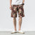 Pantalones de playa de lino floral Pantalones sueltos Pantalones cortos de estilo chino