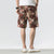 Pantalones de playa de lino floral Pantalones sueltos Pantalones cortos de estilo chino