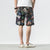 Strandhose aus Leinen mit Blumenmuster Lockere Hosen im chinesischen Stil Shorts