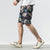 Strandhose aus Leinen mit Blumenmuster Lockere Hosen im chinesischen Stil Shorts