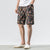 Pantalones de playa de lino floral Pantalones sueltos Pantalones cortos de estilo chino