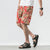 Strandhose aus Leinen mit Blumenmuster Lockere Hosen im chinesischen Stil Shorts