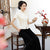 Camicia cinese a maniche corte in pizzo floreale tradizionale con top in cheongsam