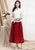 Jupe de style chinois pleine longueur en coton avec pompon