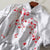 Robe trapèze à manches courtes et broderie florale