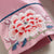 Abrigo estilo chino de seda con bordado floral a juego