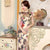 Vestido chino floral cheongsam de manga casquillo hasta el té