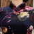 Vestido chino cheongsam de terciopelo floral de media manga hasta el té