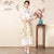 Vestido chino de dos piezas con bordado floral y cuello de ilusión