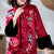 Cappotto imbottito da donna con ricamo floreale e uccellino cinese con polsino in pelliccia