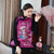 Chaleco acolchado estilo chino con bordado floral y pavo real