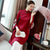 Abrigo chino tradicional con bordado floral de manga 3/4 con borla