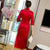 Abito Qipao di lunghezza del tè cheongsam moderno con maniche a 3/4 con ricamo scavato