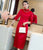 Abito Qipao di lunghezza del tè cheongsam moderno con maniche a 3/4 con ricamo scavato