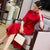 Abito Qipao di lunghezza del tè cheongsam moderno con maniche a 3/4 con ricamo scavato