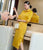 Abito Qipao di lunghezza del tè cheongsam moderno con maniche a 3/4 con ricamo scavato