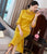 Abito Qipao di lunghezza del tè cheongsam moderno con maniche a 3/4 con ricamo scavato