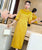 Abito Qipao di lunghezza del tè cheongsam moderno con maniche a 3/4 con ricamo scavato
