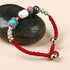 Wachsschnur mit Perlenarmband aus Jade-Türkis-Perlen