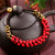 Braccialetto stile Boho con perline turchesi con cordino di cera