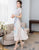 Robe Ao Dai à col mandarin et à manches longues en mousseline de soie fleurie