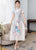 Robe Ao Dai à col mandarin et à manches longues en mousseline de soie fleurie