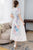 Robe Ao Dai à col mandarin et à manches longues en mousseline de soie fleurie