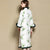 Vestido chino acolchado cheongsam con manga mandarina con borde de piel y longitud de té