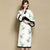 Vestido chino acolchado cheongsam con manga mandarina con borde de piel y longitud de té