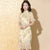 Robe chinoise Cheongsam moderne à broderie florale à manches trompette