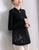 Camicia in maglia stile cinese cheongsam con ricamo floreale sul collo del buco della chiave