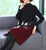 Abito con base in maglia floreale a trapezio con collo alto e lunghezza al ginocchio