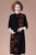 Robe trapèze en tricot à fleurs et col rond à manches longues et au genou