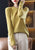 Gilet in maglia di lana orientale da donna con apertura frontale a righe