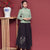 Cord Cheongsam Top Blumenstickerei Rock im chinesischen Stil Damenanzug