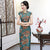 Vestido chino de encaje floral cheongsam con mangas casquillo y cuello con agujero de llave