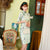 Robe chinoise traditionnelle en dentelle Cheongsam au genou avec motif de grue