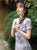 Robe de fille chic à manches courtes florale moderne Cheongsam