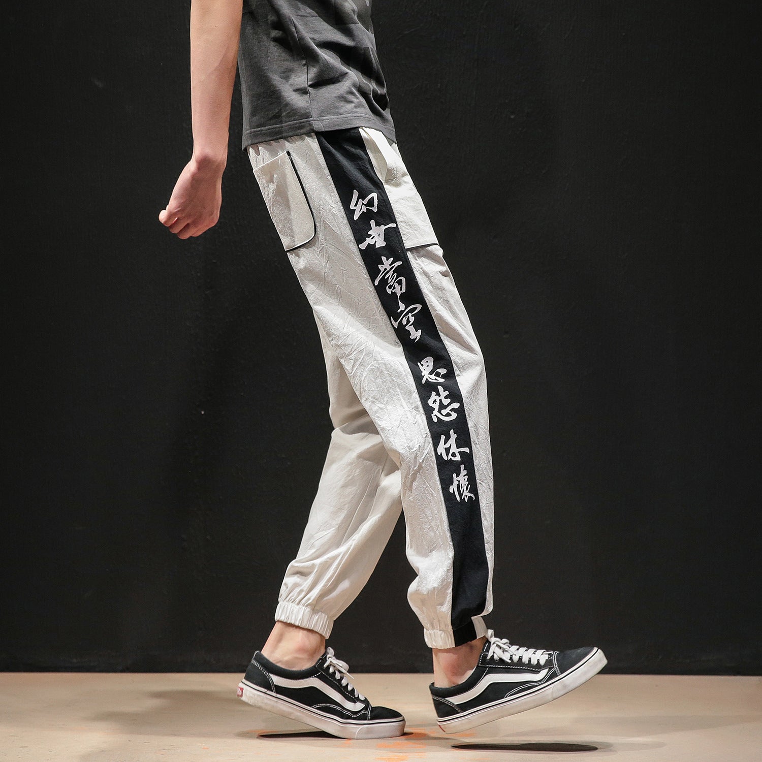 White joggers with writing best sale