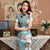 Vestido chino cheongsam moderno con patrón de paisaje dividido en la parte delantera