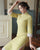 Vestido chino estilo cheongsam moderno hasta la rodilla de algodón exclusivo con borde de encaje