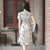 Abito da ragazza chic cheongsam moderno con maniche a sbuffo floreale in chiffon