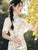Robe chinoise en dentelle florale moderne à demi-manches Cheongsam au genou
